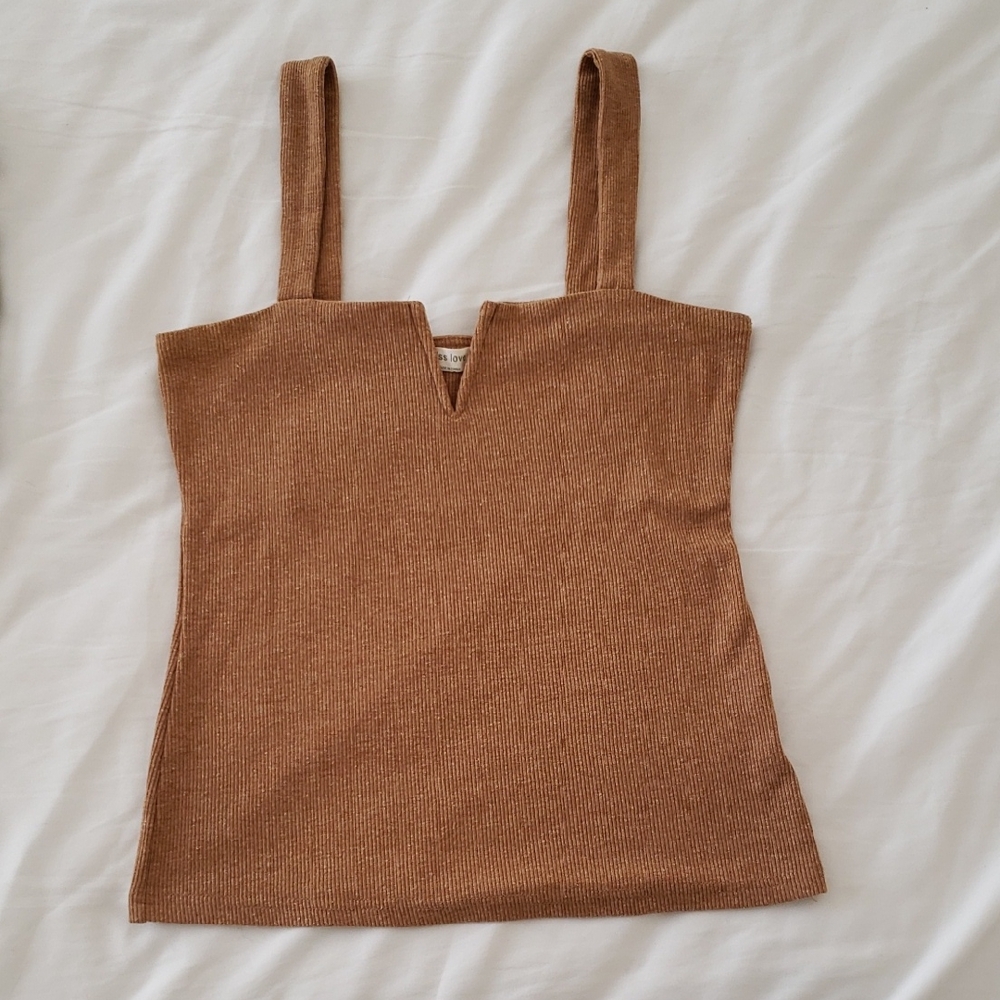 Tan tank with shaped unique neckline